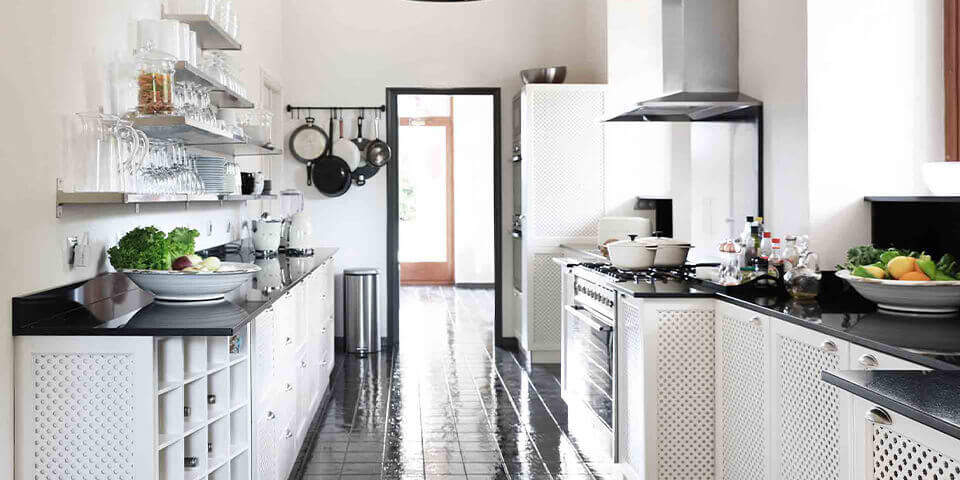 Large property outside Barcelona with black and white kitchen