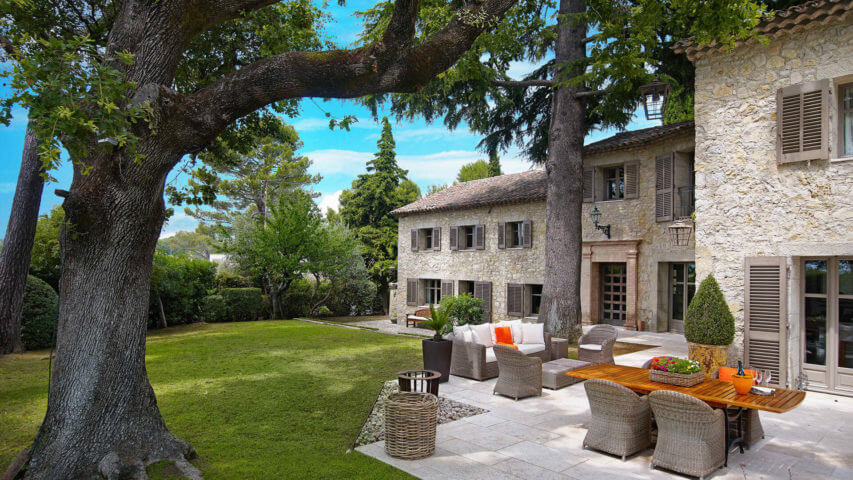 Luxury villa in Mougins patio with trees in garden and patio